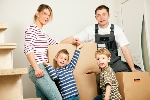 Business removals team handling office equipment in West Brompton